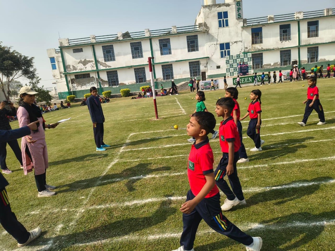 Students marching past the Greenwood Public School building during the annual sports day in Bohla, Sonipat