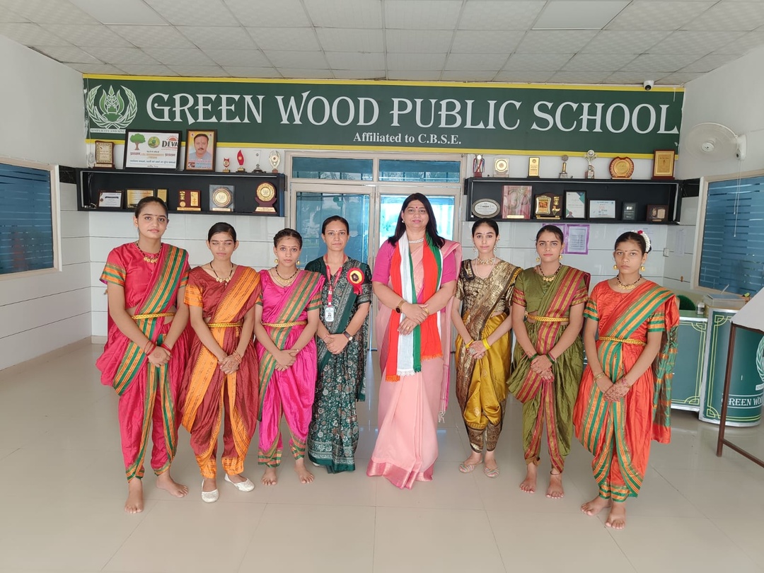 Senior students in traditional classical silk drapes and jewelry