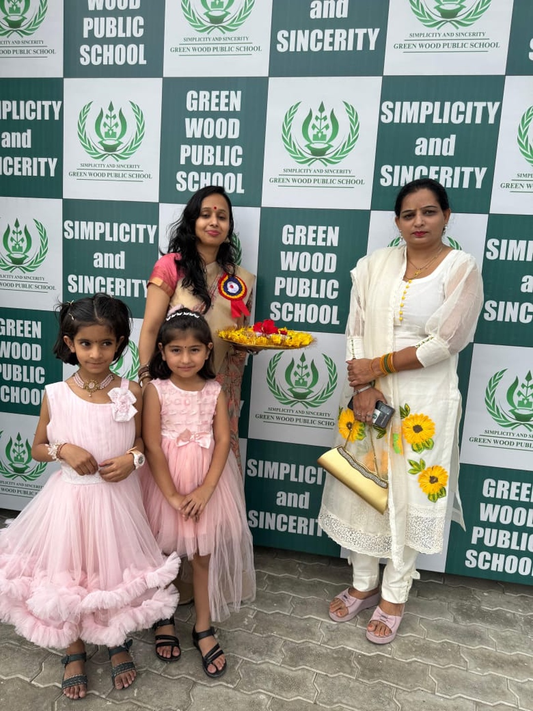 Students showcasing Mother's Day cards and heartfelt gratitude